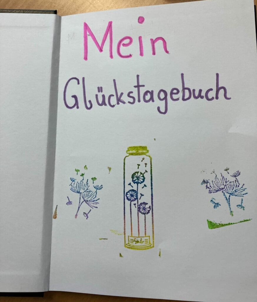 Ein beispielhaftes Glückstagebuch von einem Kind, das im Innerversum bei der Glückswoche dabei war.