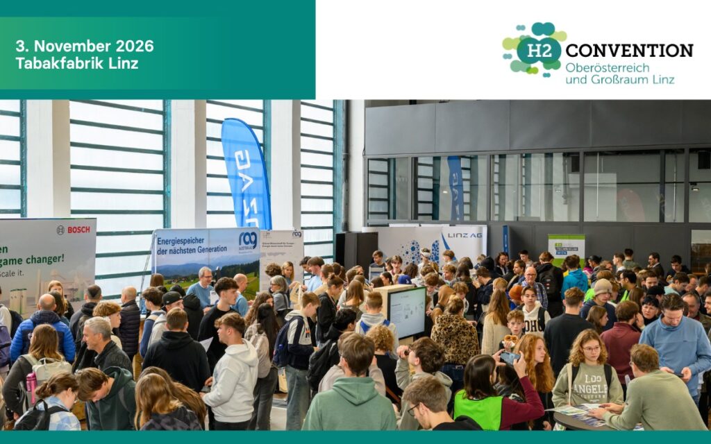 Viele Menschen sind im Hörsaal versammelt, um sich über Wasserstoff zu informieren.